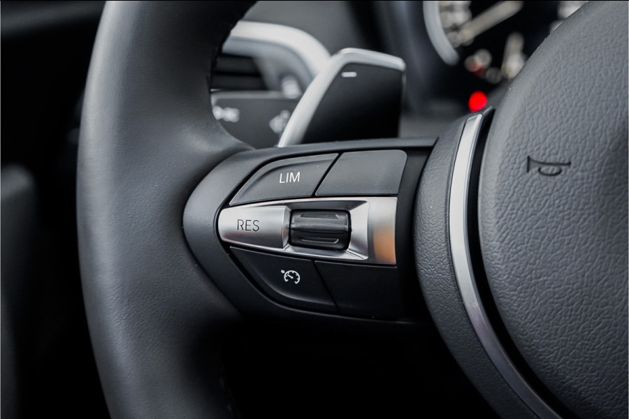 BMW 1-serie M140i Shadow Schuifdak H/K Stuurverw Camera CarPlay Leer