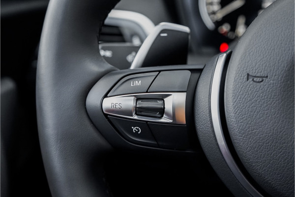 BMW 1-serie M140i Shadow Schuifdak H/K Stuurverw Camera CarPlay Leer