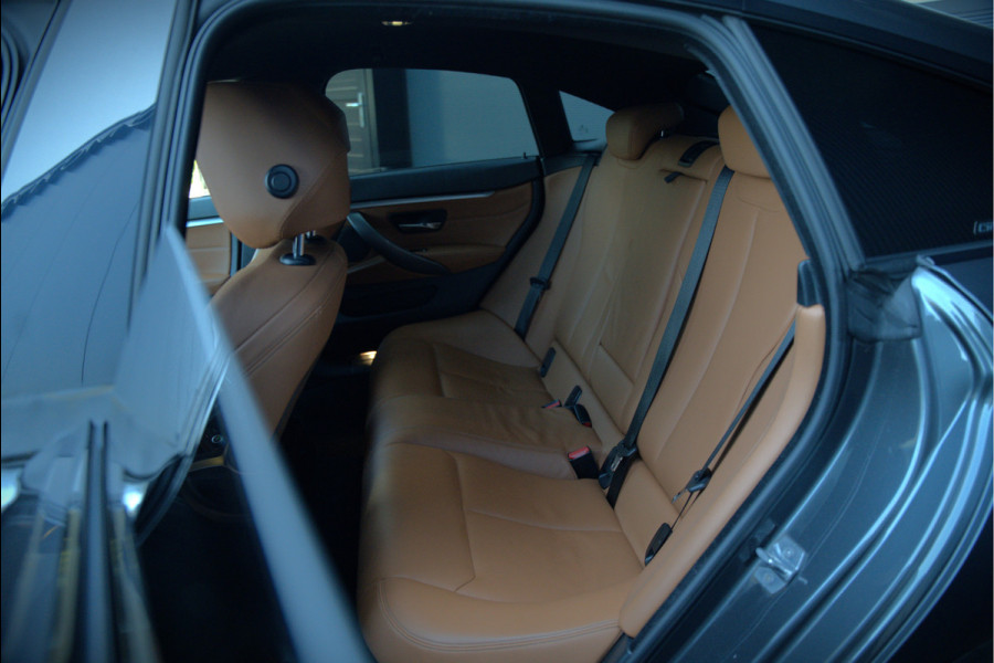 BMW 4 Serie Gran Coupé 418i High Executive M Sport | Stoelverwarming | Camera | Cognac Leer | Keyless | Shadow Line | Hifi | Automaat | NAP | DAB | LED | Navigatie Prof. | Cruise Control |