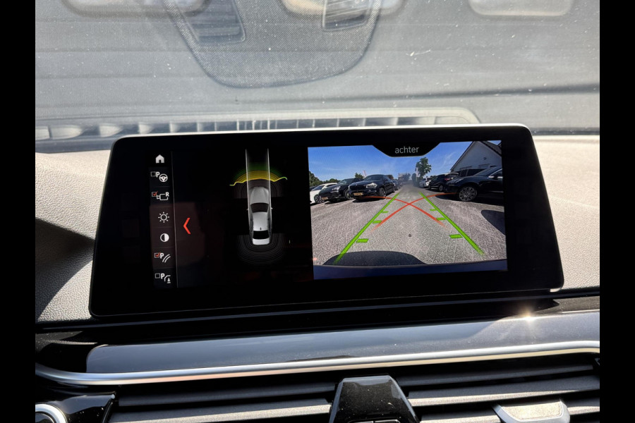 BMW 5 Serie M550i xDrive High Executive | Panoramadak | Head-Up Display | Harmon Kardon | Camera | Stoel Ventilatie/Verwarming |