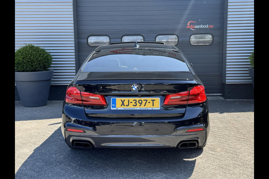 BMW 5 Serie M550i xDrive High Executive | Panoramadak | Head-Up Display | Harmon Kardon | Camera | Stoel Ventilatie/Verwarming |