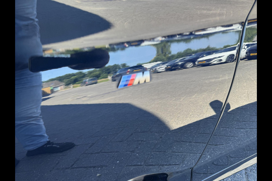 BMW 5 Serie M550i xDrive High Executive | Panoramadak | Head-Up Display | Harmon Kardon | Camera | Stoel Ventilatie/Verwarming |