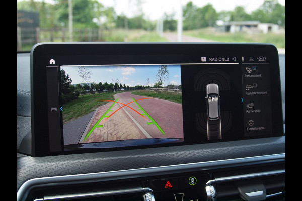 BMW iX3 High Executive Edition 80 kWh M-Pakket | Panoramadak | Trekhaak | Camera | Cruise Control | Sfeerverlichting |