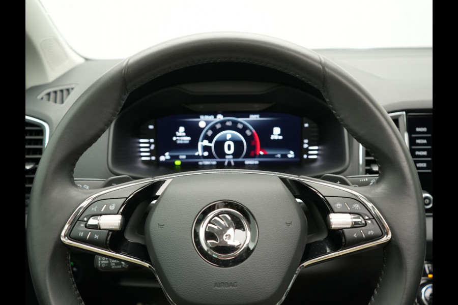 Škoda Karoq 1.5 TSI ACT Style 150pk DSG | Panodak | Trekhaak af Fabriek | Adaptive Cruise | Camera | Virtual | Apple Carplay | Sportstoelen Verwarm | 17"L.M | Keyless |