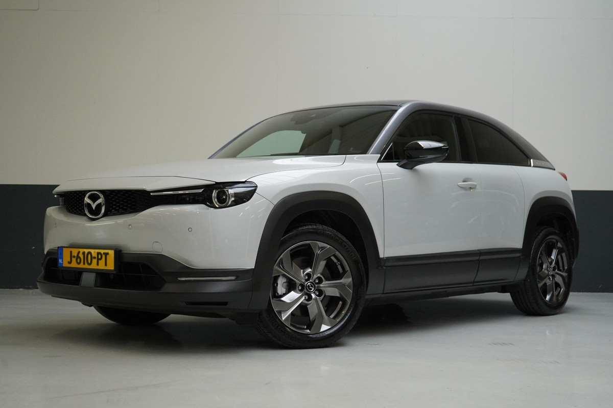 Mazda MX-30 e-SkyActiv 145 First Edition 36 kWh | Head-Up | Navigatie | Memory | Stoelverwarming | Mazda MX-30 e-SkyActiv 145 First Edition 36 kWh | Head-Up | Navigatie | Memory | Stoelverwarming |