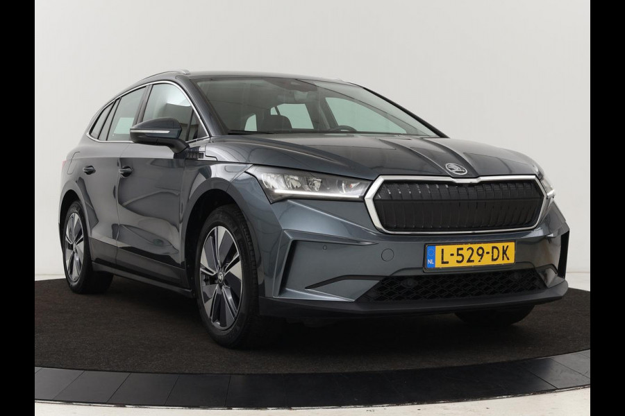 Škoda ENYAQ iV 60 | Trekhaak | Camera | Sfeerverlichting | Carplay | Full LED | Navigatie | Cruise control | Bluetooth | Parkeerhulp | DAB