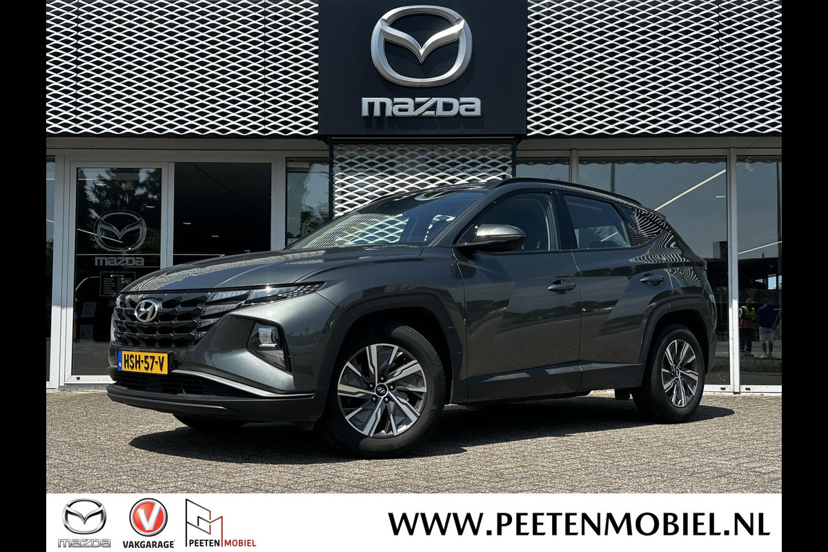 Hyundai Tucson 1.6 T-GDI MHEV i-Motion | ACHTERUITRIJCAMERA | PARKEERSENSOREN ACHTER | NAVIGATIE SYSTEEM | Hyundai Tucson 1.6 T-GDI MHEV i-Motion | ACHTERUITRIJCAMERA | PARKEERSENSOREN ACHTER | NAVIGATIE SYSTEEM |
