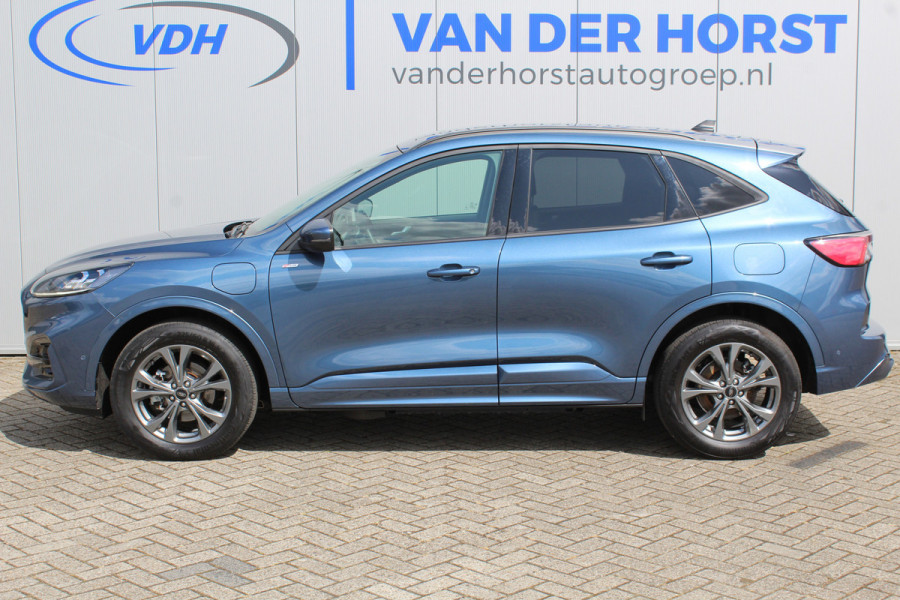 Ford Kuga 2.5-225pk PHEV ST-Line X. Hybride rijden voor een redelijke prijs ! Stoel- en voorraamverwarming, B&O soundsystem, navigatie, telefoonvoorb., metallic lak, LM wielen, side- en lane assist, camera v+a, adaptive cruise control, elektr. achterklep etc., etc.