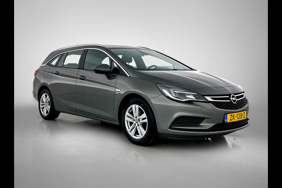 Opel Astra Sports Tourer 1.4 Turbo 120 Jaar Edition (TREKHAAK, NAVIGATIE, STUURBEDIENING, 1e EIGENAAR, GOED ONDERHOUDEN)
