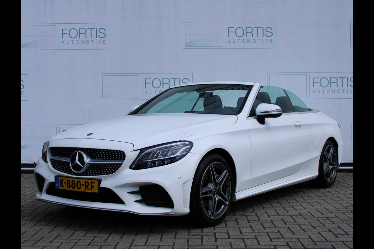 Mercedes-Benz C-Klasse Cabrio 180 Sport Edition AMG | NEKVERWARMING | STOELVERW | CAMERA | CARPLAY | DEALER ONDERHOUDEN ! Mercedes-Benz C-Klasse Cabrio 180 Sport Edition AMG | NEKVERWARMING | STOELVERW | CAMERA | CARPLAY | DEALER ONDERHOUDEN !