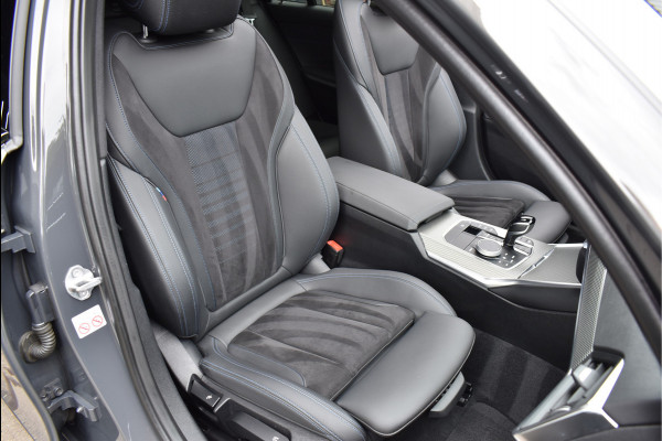 BMW 3 Serie Touring 330e M-Sport 292 Pk Individual Dravit Grijs Metallic Pano Navi Leder Laser Trekhaak Head-Up 19 Inch