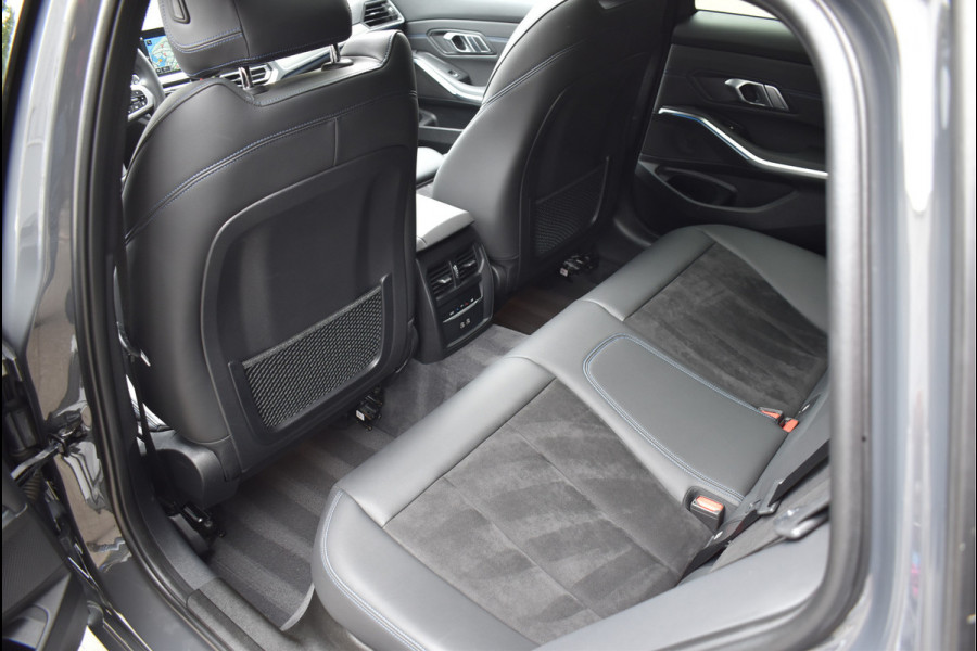 BMW 3 Serie Touring 330e M-Sport 292 Pk Individual Dravit Grijs Metallic Pano Navi Leder Laser Trekhaak Head-Up 19 Inch