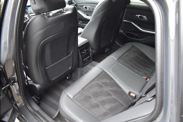 BMW 3 Serie Touring 330e M-Sport 292 Pk Individual Dravit Grijs Metallic Pano Navi Leder Laser Trekhaak Head-Up 19 Inch