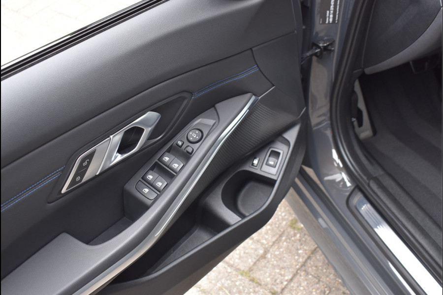 BMW 3 Serie Touring 330e M-Sport 292 Pk Individual Dravit Grijs Metallic Pano Navi Leder Laser Trekhaak Head-Up 19 Inch