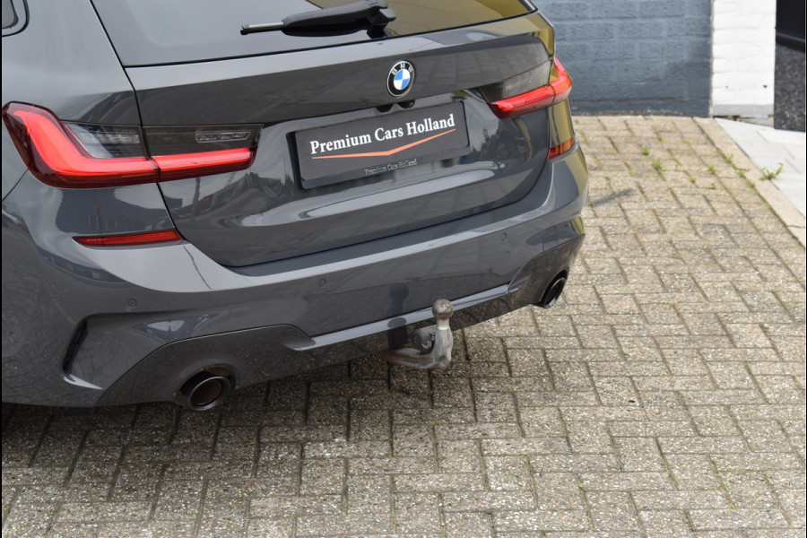 BMW 3 Serie Touring 330e M-Sport 292 Pk Individual Dravit Grijs Metallic Pano Navi Leder Laser Trekhaak Head-Up 19 Inch