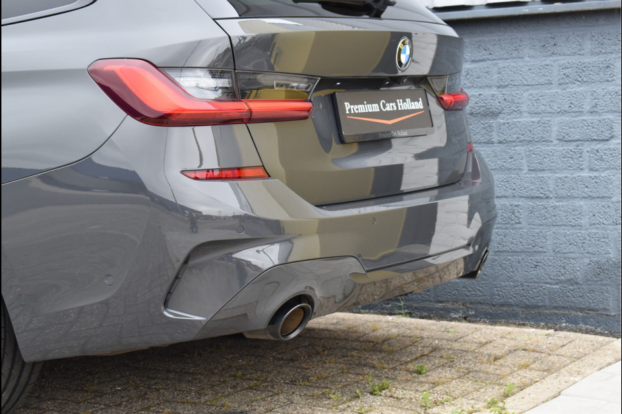BMW 3 Serie Touring 330e M-Sport 292 Pk Individual Dravit Grijs Metallic Pano Navi Leder Laser Trekhaak Head-Up 19 Inch