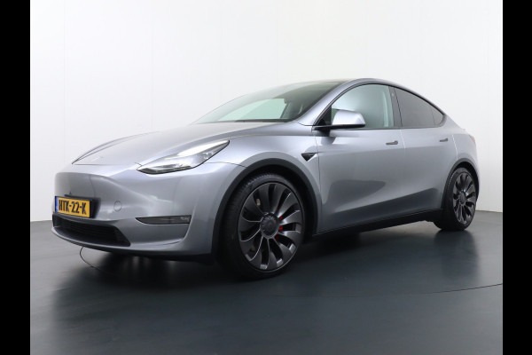 Tesla Model Y Performance 534pk 0-100 3,8 sec. AWD 78,1kWh Warmte-pomp 21"-lm FSD-Comp.3 AutoPilot Carbon-Spoiler Elekr.Achterklep AMD-Ryzen-i 3xCamera Navi LED ACC DAB Voorverwarmen interieur en Keyless via App One-Pedal-Drive Rode Remklauwen Garantie op Accu 13-04-2031 maz. 192.000km max. 250Kw laadvermogen !