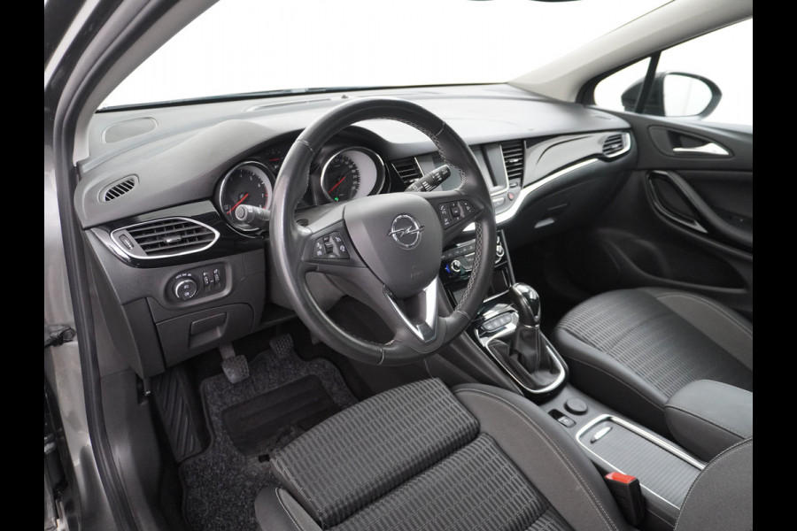 Opel Astra Sports Tourer T 111pk Navi Apple/Android Elek.klep Keyless Lane-dep. CruiseControl Pdc-a+v Ecc Licht-/Zichtpakket Bluetooth Isofix 4xElek.Ramen Mistlampen Usb 16''LM Dealer Onderhouden 1.2 Turbo Business Elegance
