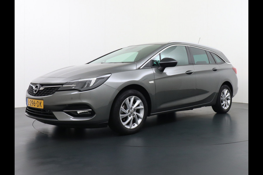 Opel Astra Sports Tourer T 111pk Navi Apple/Android Elek.klep Keyless Lane-dep. CruiseControl Pdc-a+v Ecc Licht-/Zichtpakket Bluetooth Isofix 4xElek.Ramen Mistlampen Usb 16''LM Dealer Onderhouden 1.2 Turbo Business Elegance