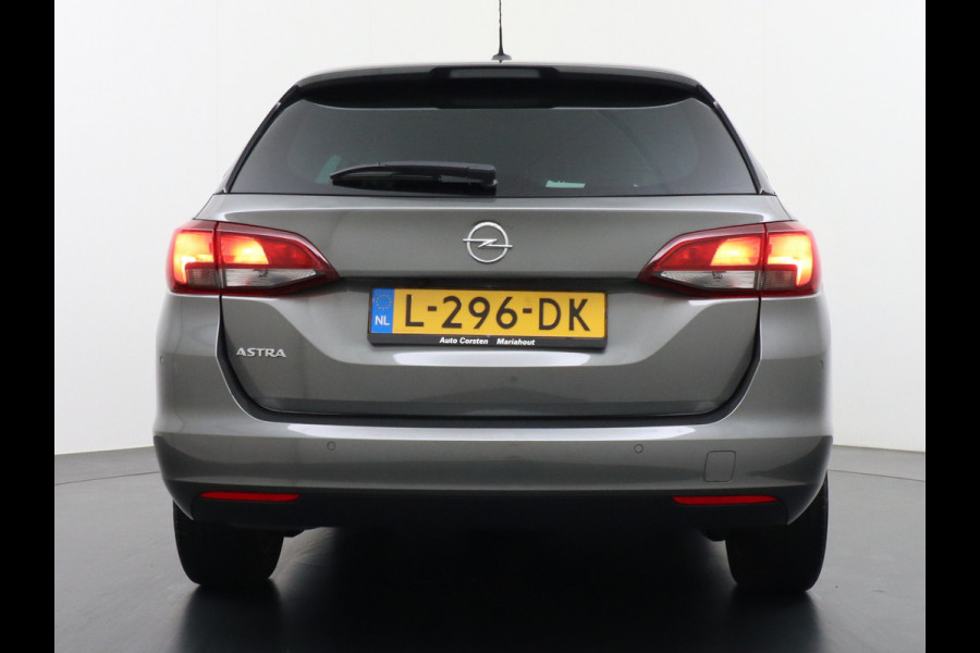 Opel Astra Sports Tourer T 111pk Navi Apple/Android Elek.klep Keyless Lane-dep. CruiseControl Pdc-a+v Ecc Licht-/Zichtpakket Bluetooth Isofix 4xElek.Ramen Mistlampen Usb 16''LM Dealer Onderhouden 1.2 Turbo Business Elegance