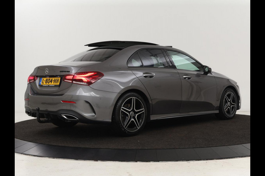 Mercedes-Benz A-Klasse 200 Business Solution AMG | Panoramadak | Stoelverwarming | Trekhaak | Matrix LED | Memory | Carplay | Keyless | Camera | Sfeerverlichting | Leder/Alcantara | Park Assist