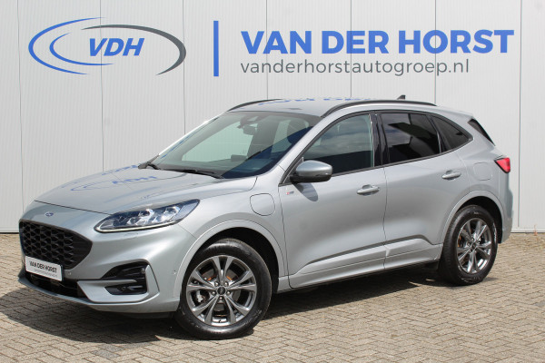 Ford Kuga 2.5-225pk PHEV ST-Line X. Hybride rijden voor een redelijke prijs ! Volautm. airco dual, Metallic lak, Stuur-, stoel-, achterbank- en voorraamverwarming, Side-en lane assist, Camera, pdc v+a, Adaptive Cruise Control, Elektr. achterklep etc, etc.