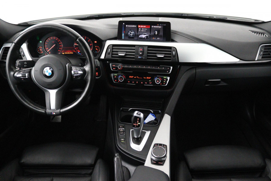 BMW 3 Serie Touring 318i M Sport Edition (STOELVERWARMING, NAVIGATIE, PARKEERSENSOREN, AUTOMAAT, CRUISE CONTROL, NL-AUTO)