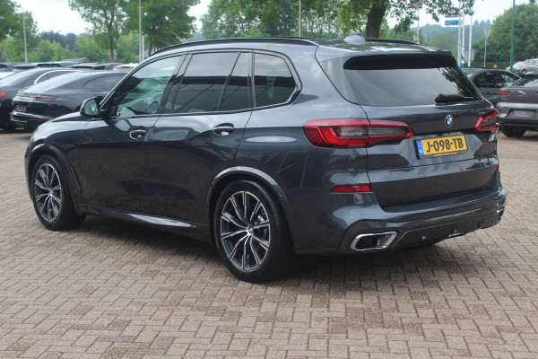BMW X5 xDrive30d High Exe. 7p. M Sport / Trekhaak / Panoramadak / Camera / Head-up / Softclose / 20'' / Harman Kardon / Luchtvering / Laser LED / Keyless / Leder / Apple CarPlay / Stuurverwarming / DAB / ACC / Zonnescherm zijruite