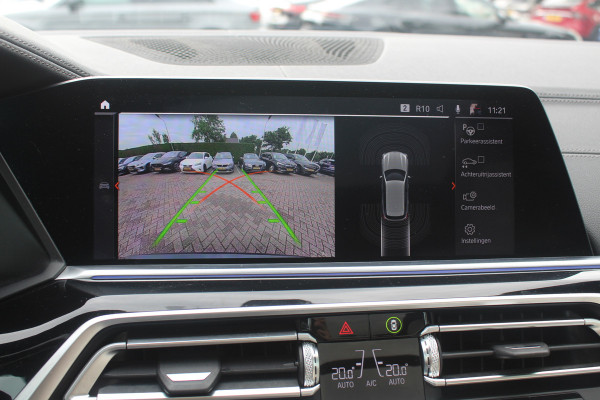 BMW X5 xDrive30d High Exe. 7p. M Sport / Trekhaak / Panoramadak / Camera / Head-up / Softclose / 20'' / Harman Kardon / Luchtvering / Laser LED / Keyless / Leder / Apple CarPlay / Stuurverwarming / DAB / ACC / Zonnescherm zijruite