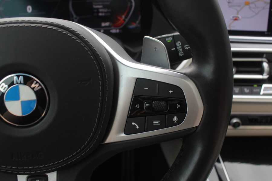 BMW X5 xDrive30d High Exe. 7p. M Sport / Trekhaak / Panoramadak / Camera / Head-up / Softclose / 20'' / Harman Kardon / Luchtvering / Laser LED / Keyless / Leder / Apple CarPlay / Stuurverwarming / DAB / ACC / Zonnescherm zijruite