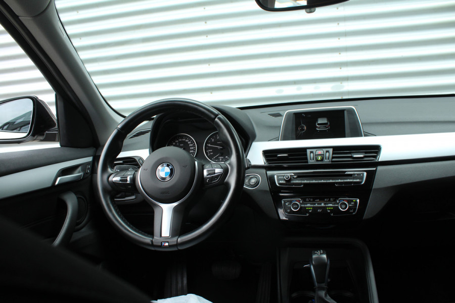 BMW X1 sDrive18i 136pk Centennial Executive AUTOMAAT NL-Auto NAP Clima Cruise Navi PDC 17"LMV Afn. Trekaak 1700kg