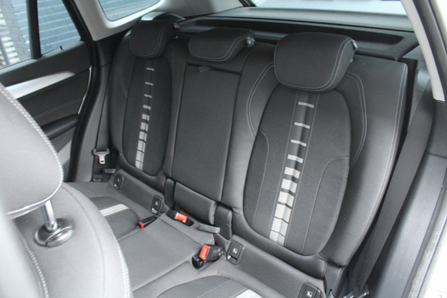 BMW X1 sDrive18i 136pk Centennial Executive AUTOMAAT NL-Auto NAP Clima Cruise Navi PDC 17"LMV Afn. Trekaak 1700kg