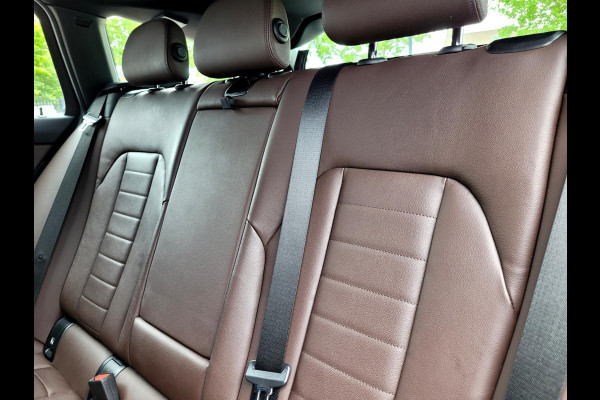 BMW 3 Serie Touring 320i Sport-Line, Camera, M-stuur, El. tr.haak (BTW, NAP, NL-auto)