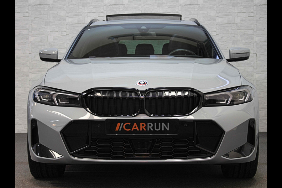 BMW 3 Serie Touring 330e 292pk M-Sport-Pro | Carbon | ACC | Stuurverw. | M50 jahre | M340 Bumper en uitlaat | E.TH 1500kg | Pano | Camera | Dab+ | Adaptieve Cruise Control | Ambiance | Lane & Side Assist  | Apple & Android Carplay | Fabrieksgarantie.