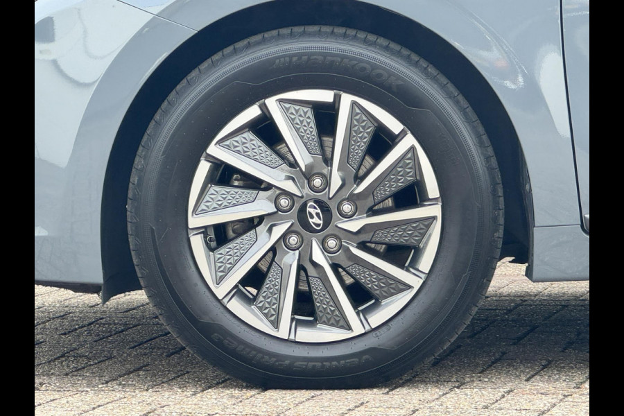Hyundai IONIQ Premium EV 38 kWh Adaptive cruise control Climate control Stoel- en stuurverwarming Achterbankverwarming Snelladen
