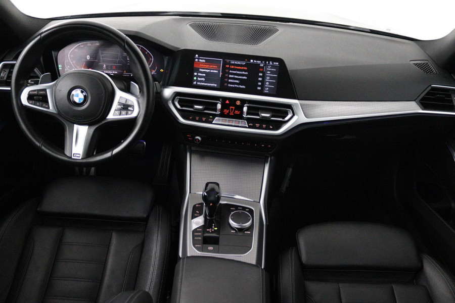 BMW 3-serie 320i High Executive Edition (TREKHAAK, PARKEERSENSOREN, STOELVERWARMING, LEER, NAVIGATIE, NL-AUTO)