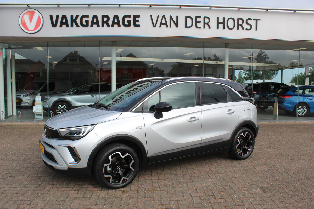 Opel Crossland 1.2-110pk Turbo 'Elegance'. Mooie en luxe hoogzitter met weinig km's ! Volautm. airco dual, cruise control, camera, comfortstoelen, metallic lak, LM wielen, navigatie, telefoonvoorb., lane- en side assist, parkeersensoren v+a, LED verlichting etc. Opel Crossland 1.2-110pk Turbo 'Elegance'. Mooie en luxe hoogzitter met weinig km's ! Volautm. airco dual, cruise control, camera, comfortstoelen, metallic lak, LM wielen, navigatie, telefoonvoorb., lane- en side assist, parkeersensoren v+a, LED verlichting etc.