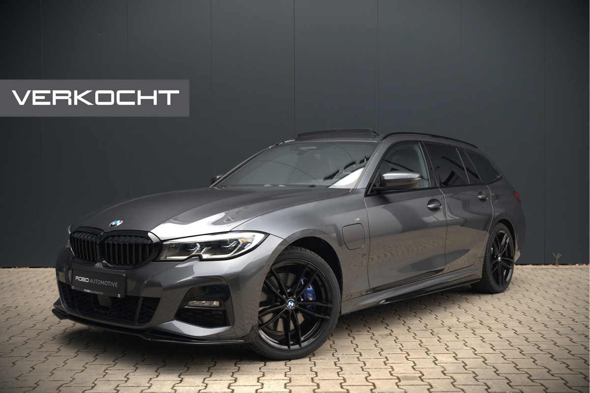 BMW 3 Serie Touring 330e xDrive High Executive M Sport | M Performance | Panoramadak | Harman Kardon | 360° Camera | Assisted Driving | Head Up Display | Stoelverwarming | Stuurverwarming | Apple Carplay | Navigatie | Adaptive Cruise Control | Am BMW 3 Serie Touring 330e xDrive High Executive M Sport | M Performance | Panoramadak | Harman Kardon | 360° Camera | Assisted Driving | Head Up Display | Stoelverwarming | Stuurverwarming | Apple Carplay | Navigatie | Adaptive Cruise Control | Am