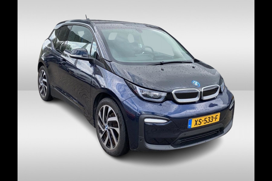 BMW i3 Basis 120Ah 42 kWh / Camera / Navigatie / 19'' / Harman Kardon / Stoelverwarming / Cruise Control / Warmtepomp / Getint glas