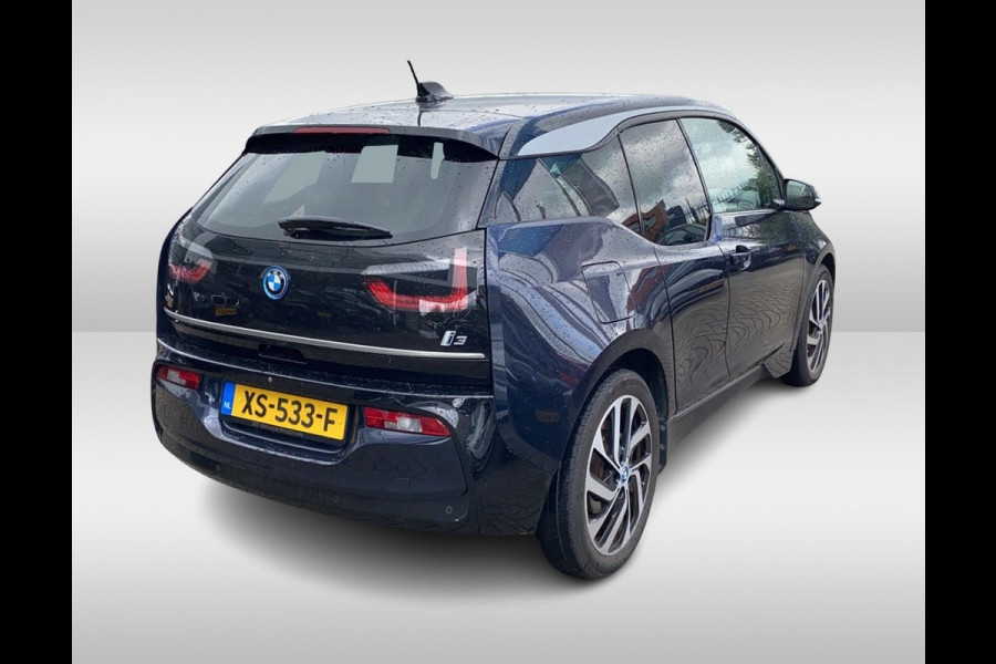 BMW i3 Basis 120Ah 42 kWh / Camera / Navigatie / 19'' / Harman Kardon / Stoelverwarming / Cruise Control / Warmtepomp / Getint glas