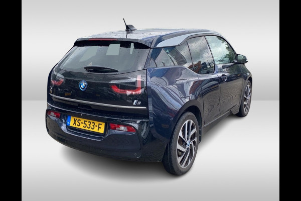 BMW i3 Basis 120Ah 42 kWh / Camera / Navigatie / 19'' / Harman Kardon / Stoelverwarming / Cruise Control / Warmtepomp / Getint glas