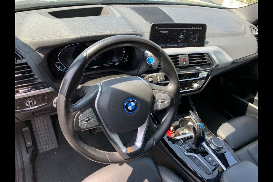 BMW iX3 High Executive 80 kWh / Trekhaak / Panoramadak / 360Camera / Head-up / 20'' / Leder / Harman Kardon / Navigatie / Memory seats / Dodehoek / DAB / Stoelverwarming / Cruise Control Adaptief