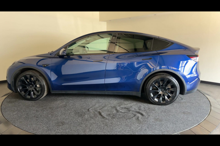 Tesla Model Y RWD 58 kWh | Prachtig blauw | Wit lederen interieur | | Soh (batterijcheck) 93,1 %