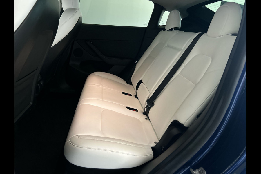 Tesla Model Y RWD 58 kWh | Prachtig blauw | Wit lederen interieur | | Soh (batterijcheck) 93,1 %