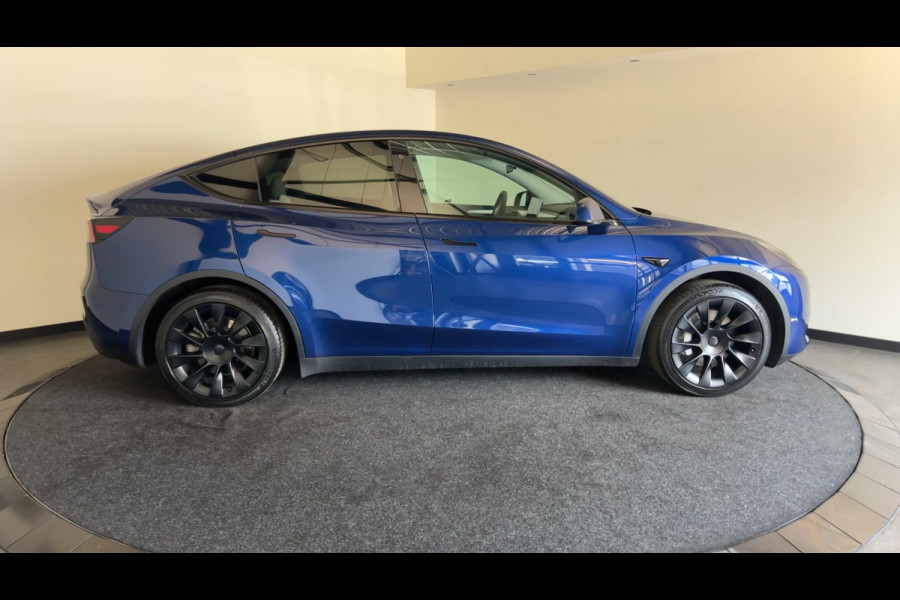 Tesla Model Y RWD 58 kWh | Prachtig blauw | Wit lederen interieur | | Soh (batterijcheck) 93,1 %