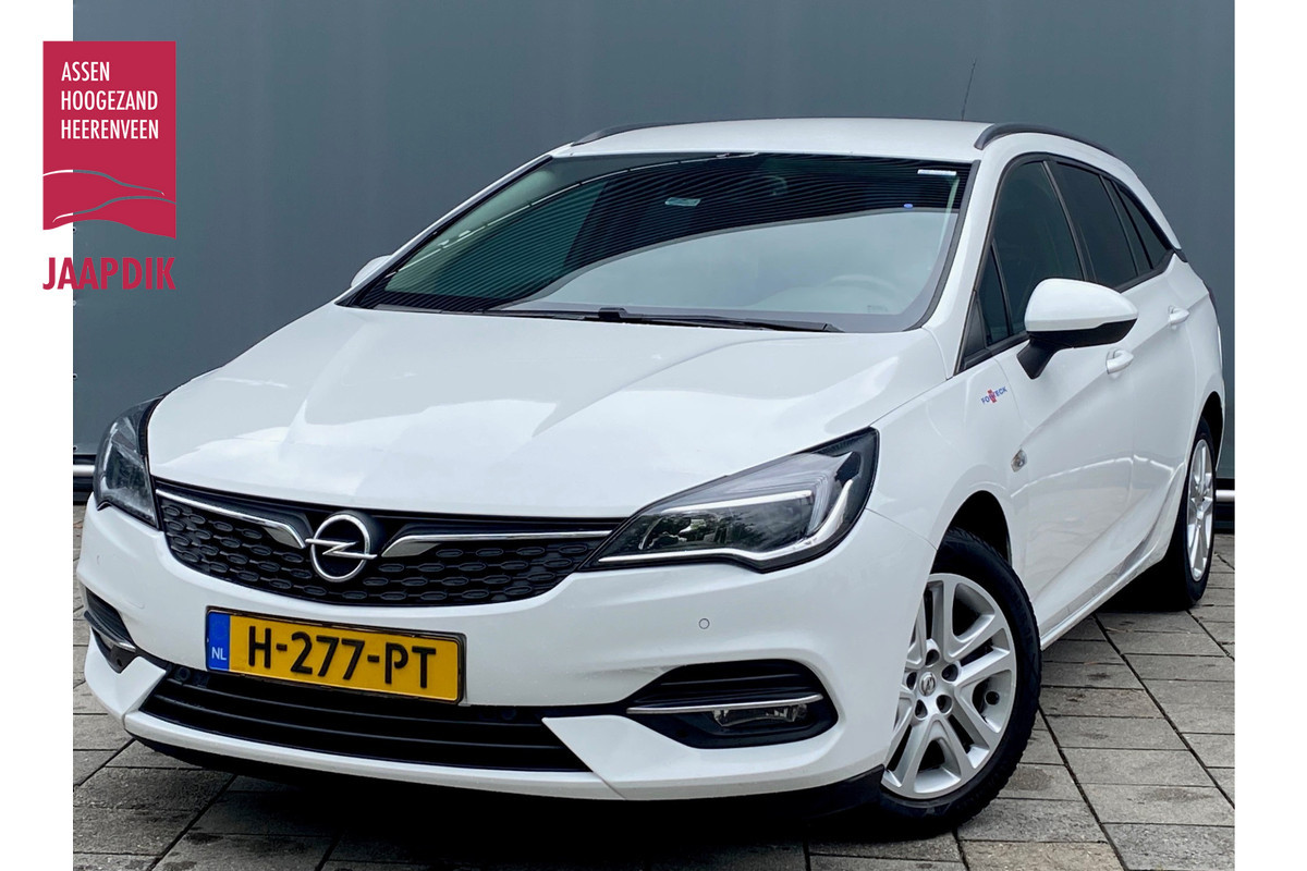 Opel Astra Sports Tourer BWJ 2020 | 1.2T 146PK Business Ed | TRKEHAAK | CLIMA | NAVI | PDC | CRUISE | CARPLAY | CAMERA | Opel Astra Sports Tourer BWJ 2020 | 1.2T 146PK Business Ed | TRKEHAAK | CLIMA | NAVI | PDC | CRUISE | CARPLAY | CAMERA |