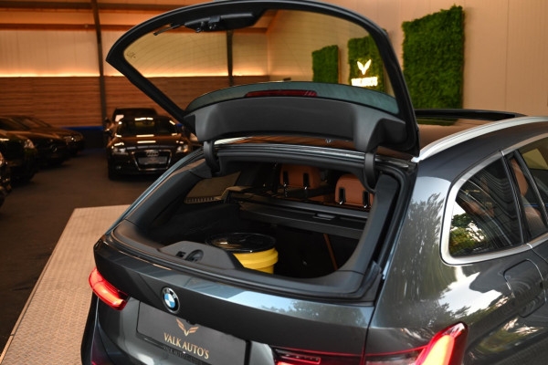 BMW 3 Serie Touring 320i High Executive Edition - Adaptive Cruise Control - Memory - Panoramadak - El. Trekhaak - Dashboard Leder