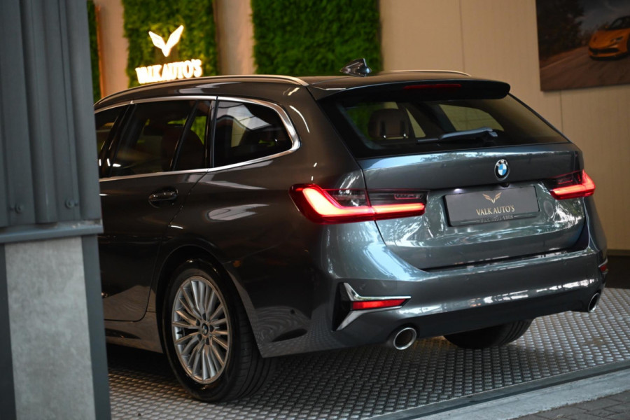 BMW 3 Serie Touring 320i High Executive Edition - Adaptive Cruise Control - Memory - Panoramadak - El. Trekhaak - Dashboard Leder