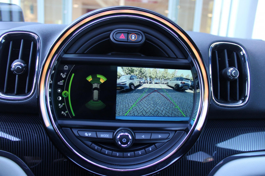 MINI Countryman 2.0 Cooper S E 220PK AUTOMAAT ALL4 JCW | JOHN COOPER WORKS INTERIEUR | COMFORT ACCESS | PANORAMISCH SCHUIF/KANTELDAK | ACHTERUITRIJ CAMERA | PARKEERSENSOREN VOOR EN ACHTER | STOEL VERWARMING | SPORTSTOELEN JOHN COOPER WORKS | ADAPTIEVE LED KOPLAMPEN | ADAPTIVE CRUISE CONTROL | DAB+ RADIO | KARMAN KARDON AUDIO SYSTEM | HEAD UP DISPLAY | NAVIGATIE | DRAADLOZE APPLE CARPLAY | JOHN COOPER WORKS TRIM METALLICM LAK | ALL SEASON BANDEN | DRAADLOZE TELEFOONLADER |