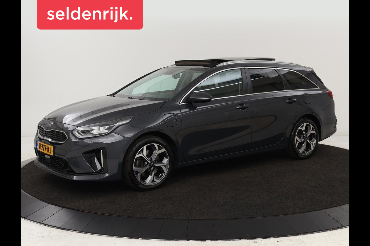 Kia Ceed 1.6 GDI PHEV ExecutiveLine | Panoramadak | Stoelventilatie | Trekhaak | Leder | Camera | Adaptive cruise | Keyless | Full LED | Stuur & achterbankverwarming | Carplay | Navigatie Kia Ceed 1.6 GDI PHEV ExecutiveLine | Panoramadak | Stoelventilatie | Trekhaak | Leder | Camera | Adaptive cruise | Keyless | Full LED | Stuur & achterbankverwarming | Carplay | Navigatie